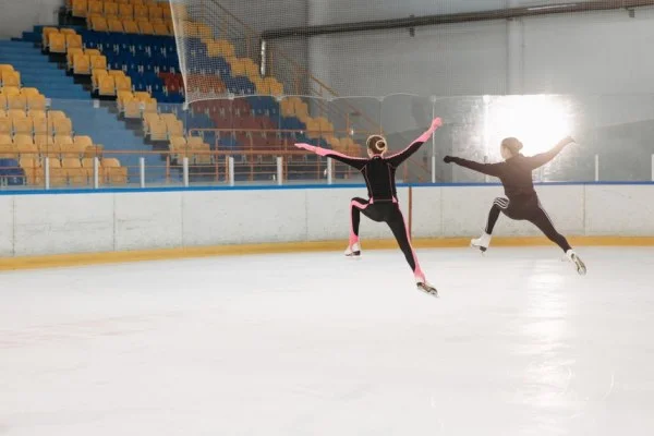 figure skater jumping on ice